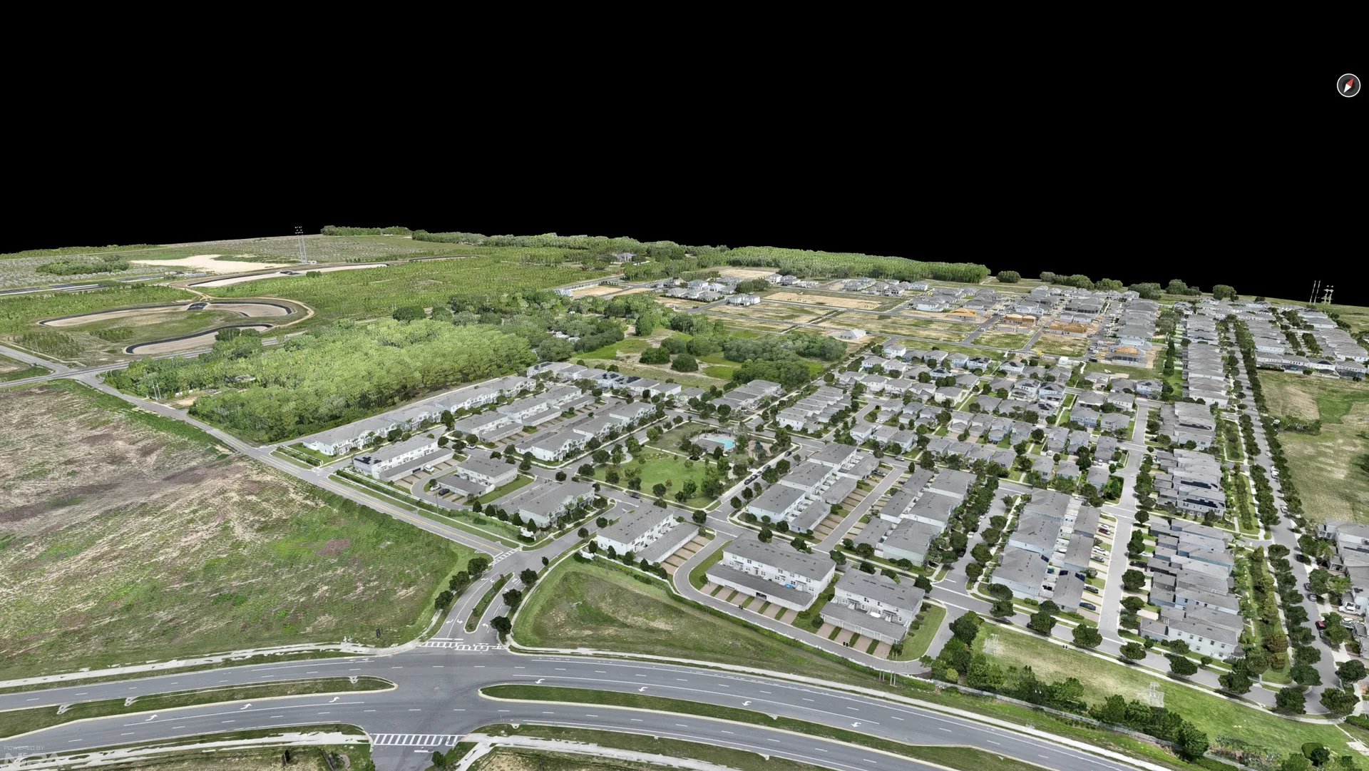 The same Hamlin / Horizon West site rendered in the photogrammetry viewer, showing the residential corridor, road network, and the textured geometry that was imported into Unreal Engine 5 for the developer's interactive sales center experience