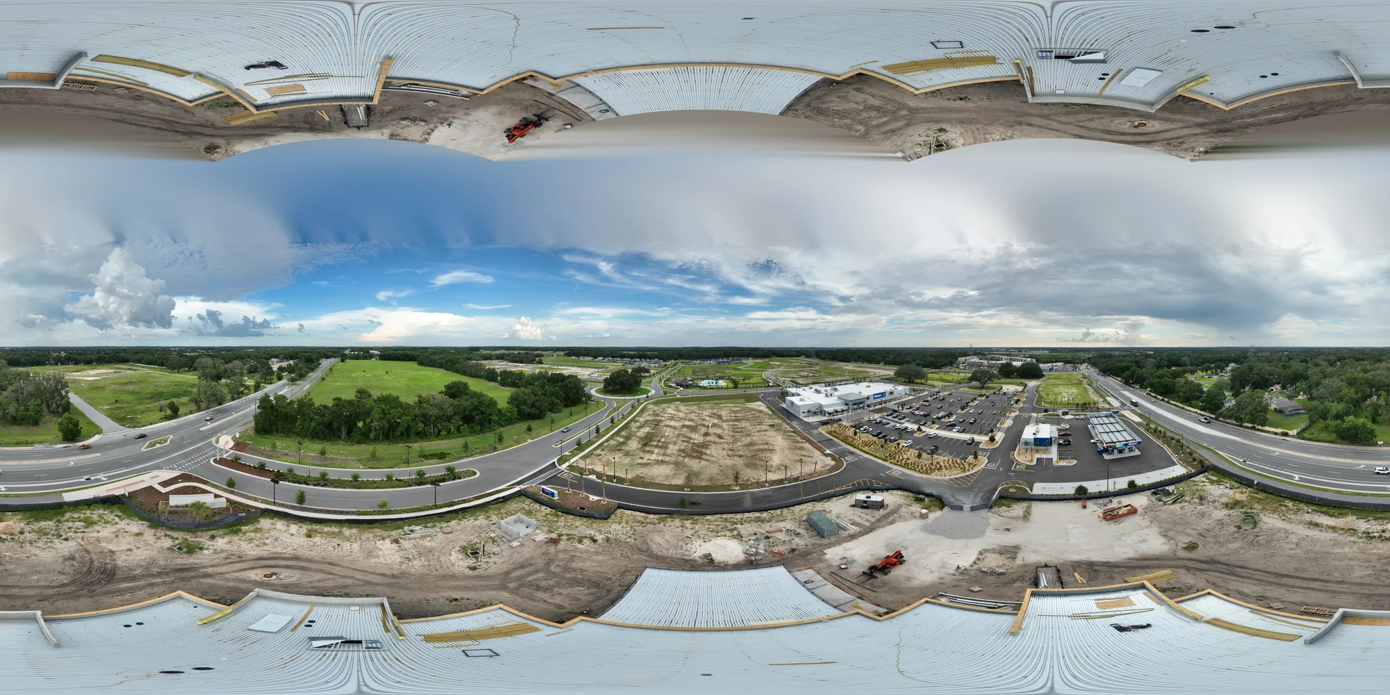 Aerial 360-degree panorama of the completed Walmart Supercenter with gas station in Lady Lake, Florida at the end of the 11-month weekly aerial documentation engagement, showing the building, fueling canopy, parking lot, and site landscaping, captured June 25, 2026.